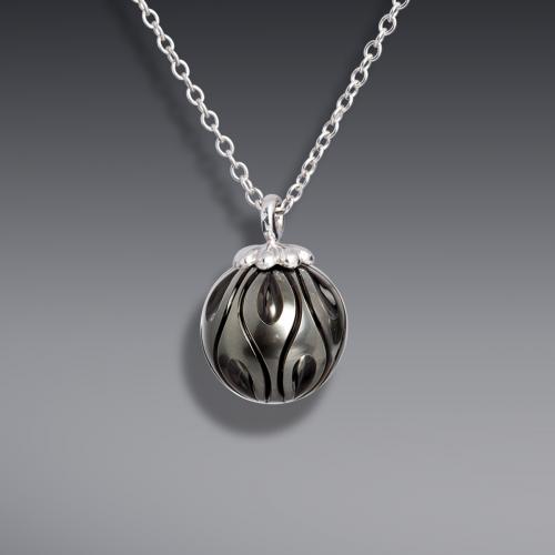Carved Pearl Pendant